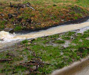 Stormwater overflows existing drainage channels